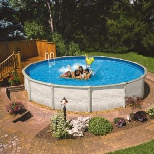 Family swimming in above ground swimming pool