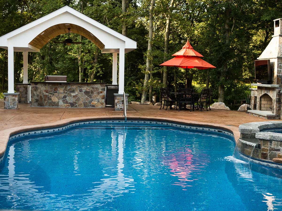 outdoor kitchen and inground pool
