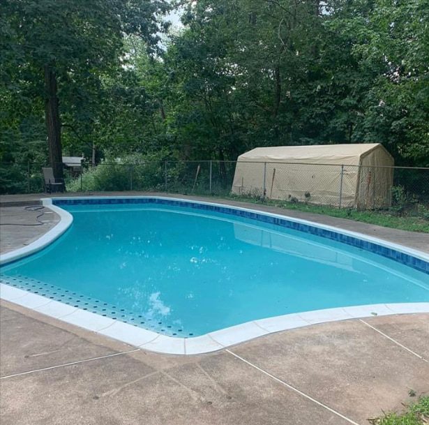 Clean pool after renovation in backyard